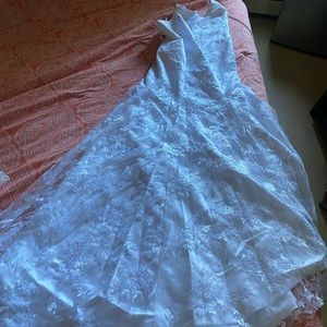 I am selling my wedding dress never used it